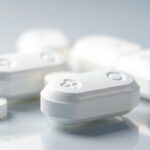 Kalmopyrin, acetilszalicilsav alapú gyógyszerek fehér tabletták formájában.